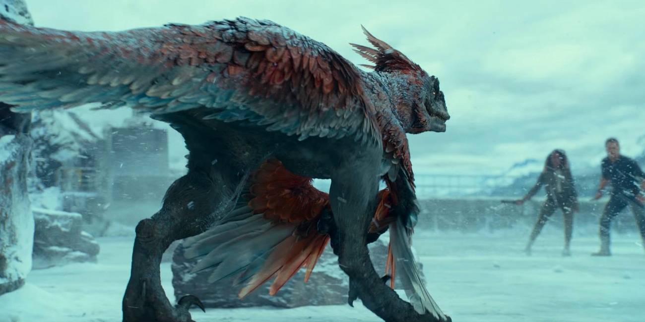 dinosaurio con plumas en combate