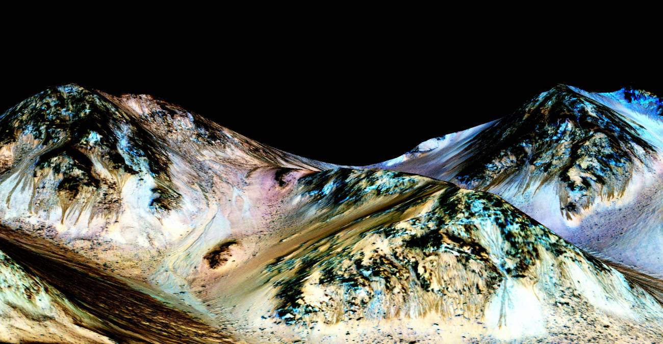 Ejemplos de oscuras “líneas de ladera recurrentes” (RSL) en Marte. / NASA/JPL/University of Arizona