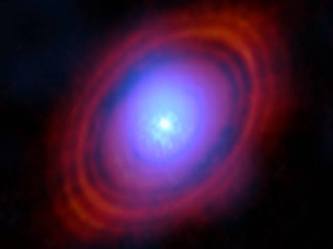 Vapor de agua en tonos azules en el disco que rodea la estrella HL Tauri